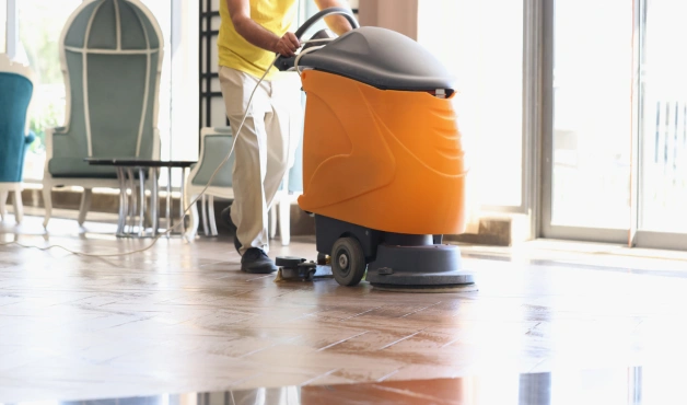 Annual Maintenance Contract Cleaning Dubai Professional floor cleaning machine used for AMC cleaning services in Dubai building lobby